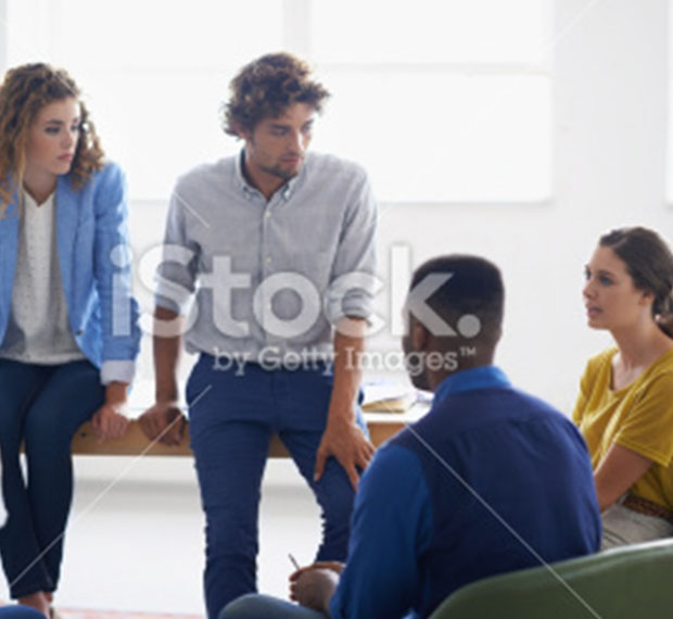 Group of young casually dressed adults talking