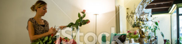 young florist cutting roses